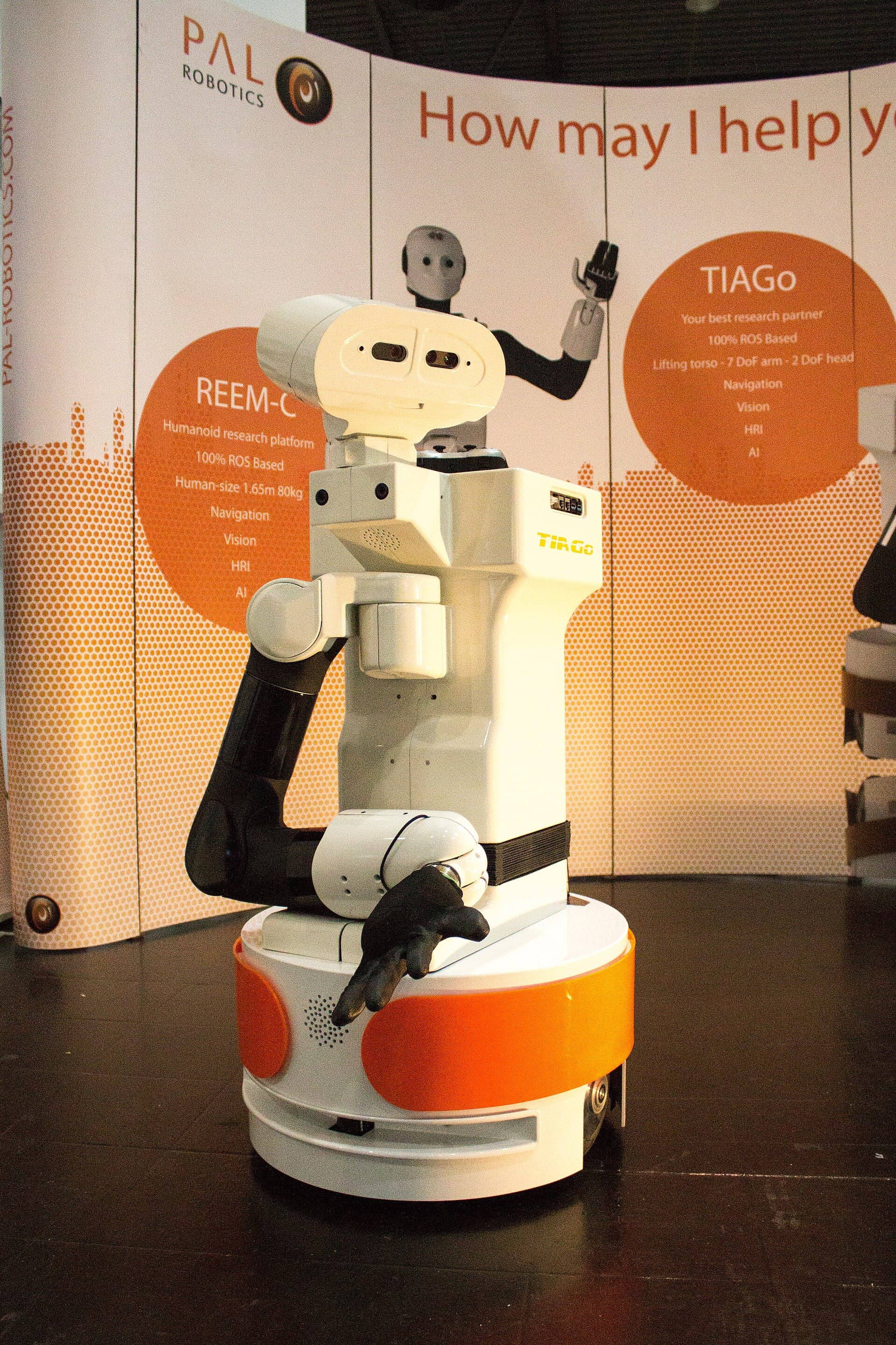 PAL Robotics TIAGo mobile manipulator at a robotics research demonstration