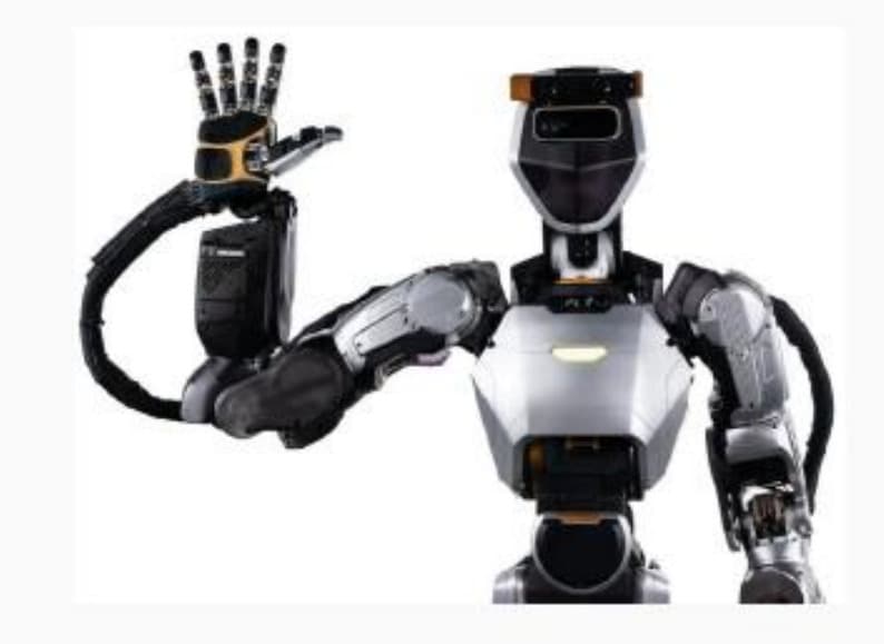 Caption explicitly labels middle-row position 3 as Phoenix (Sanctuary AI).